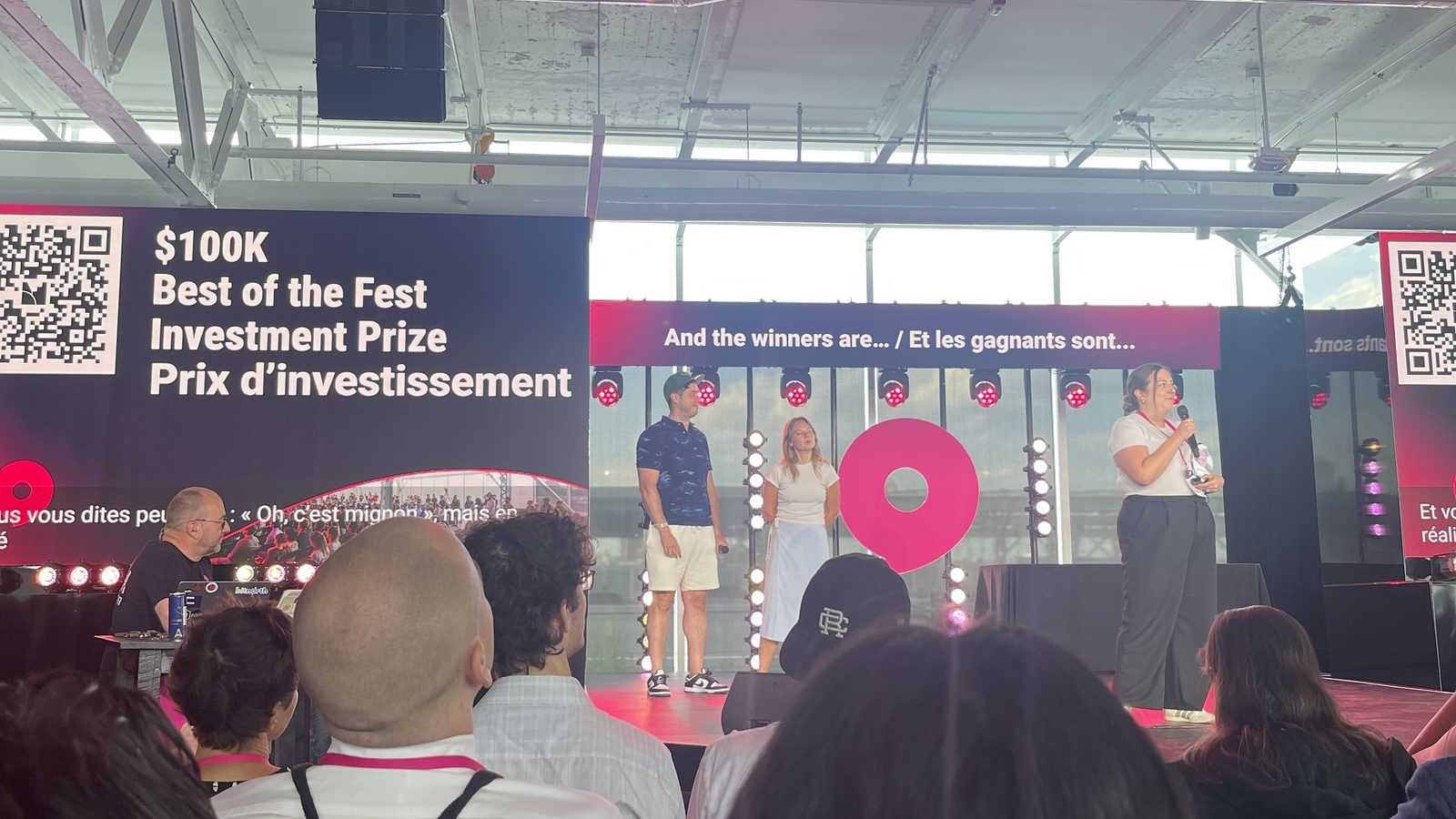 AgroGene Solutions winners on stage beside the Best of the Fest prize banner